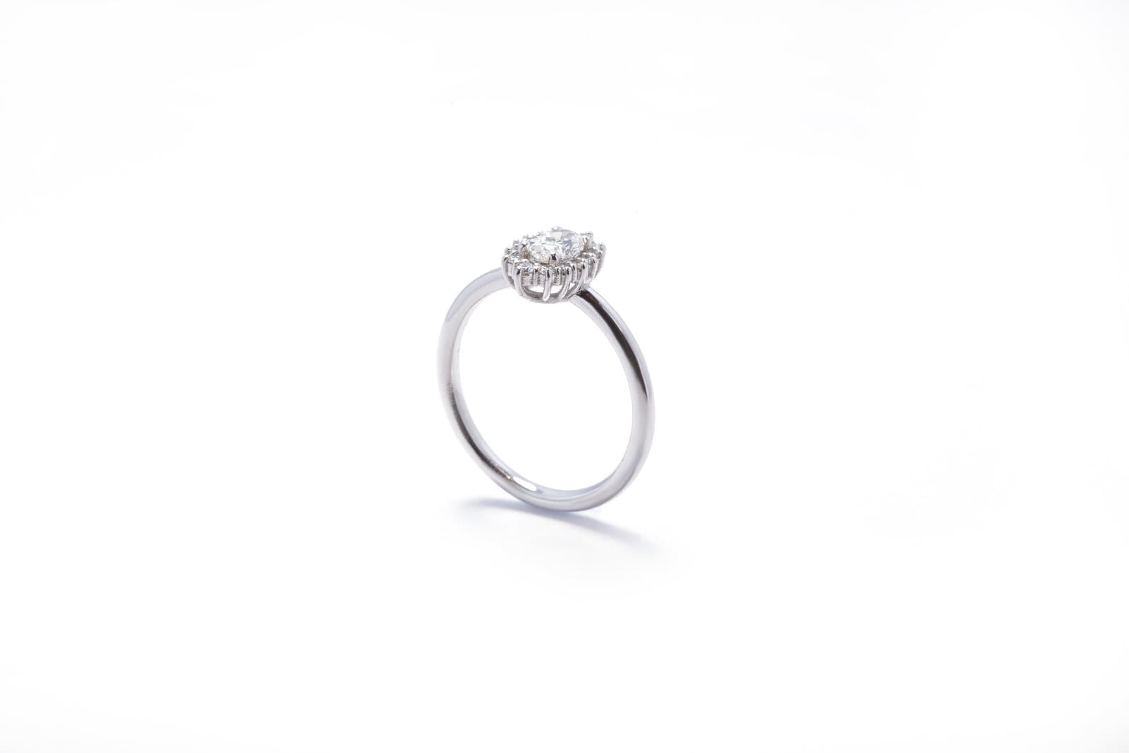 Handcrafted oval shaped diamond ring with a halo - 2